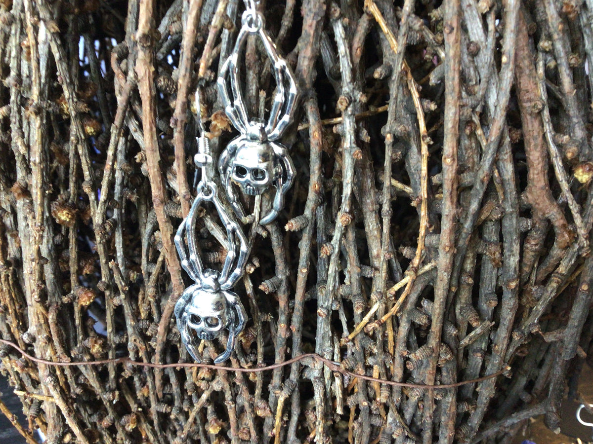 Blacbutterflies false widow earrings