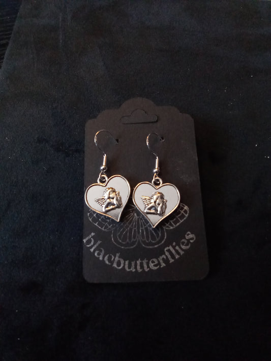 Blacbutterflies cherub hearts