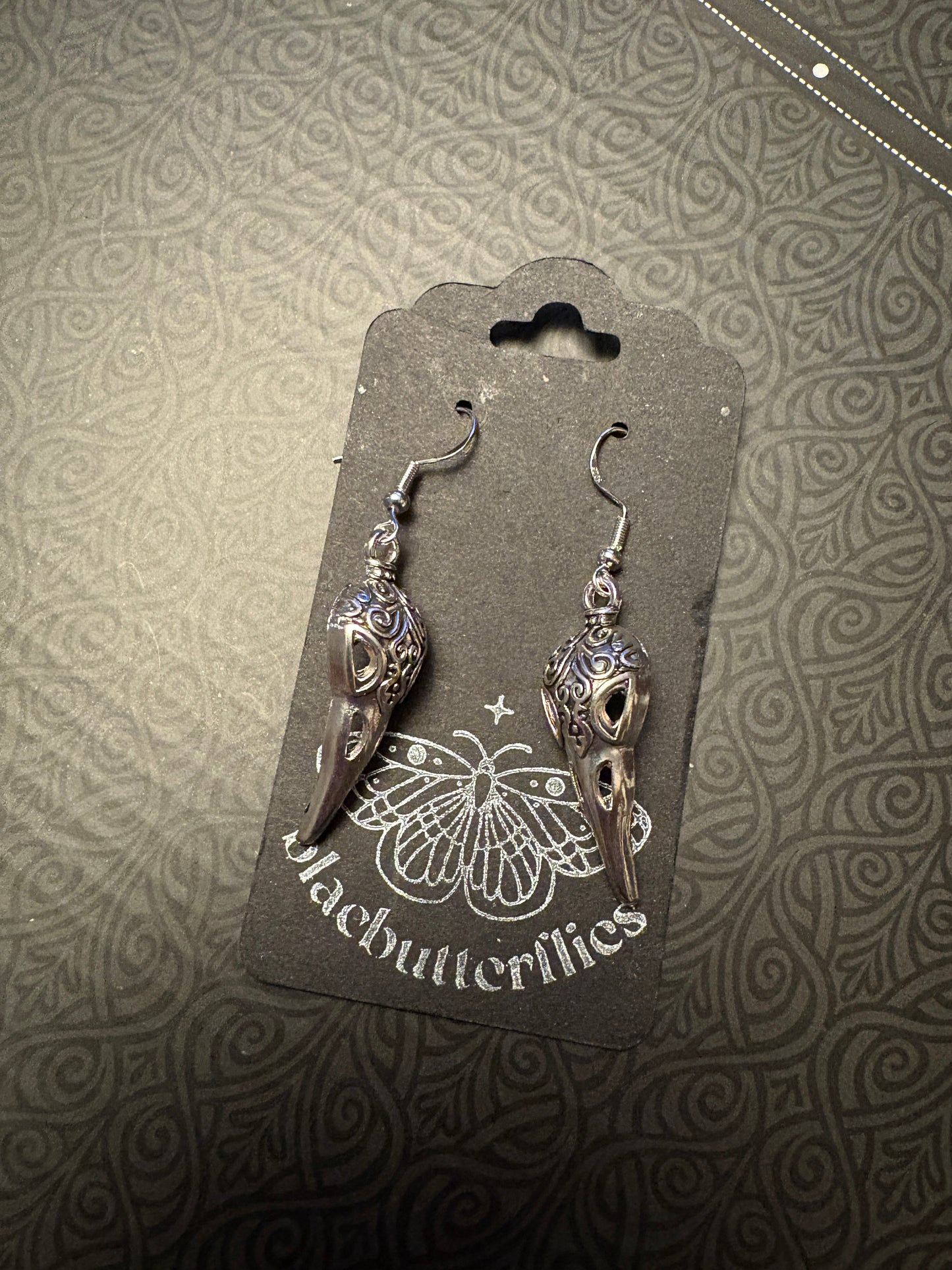 blacbutterflies Bird Skull earrings