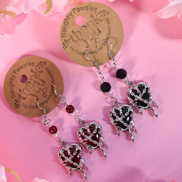 Naughty Pawsies Bleeding Hearts earrings
