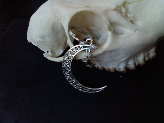 Blacbutterflies keyring moon and star