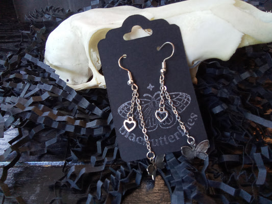 Blacbutterflies mini butterflies on a silver chain with hearts earrings