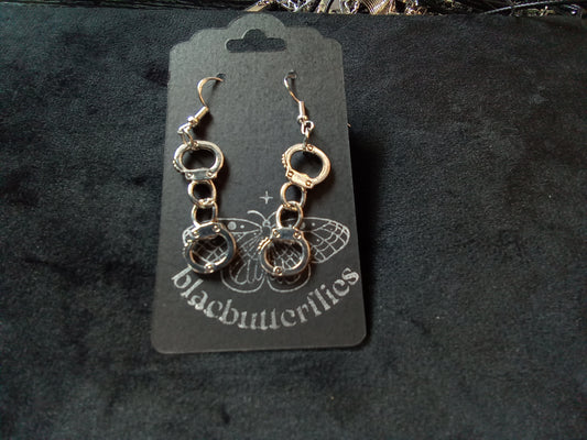 Blacbutterflies small handcuff earrings